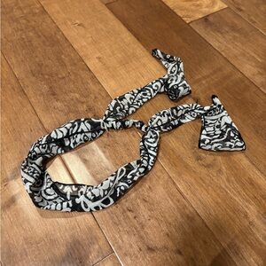 This Vintage Headbands, one Black and White Patterned, one solid white.